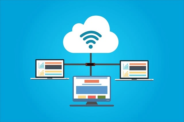 Graphic depicting computers and cloud hosting.