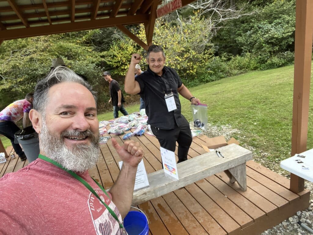 Photo of Xandon & Joe at the tie-dye area