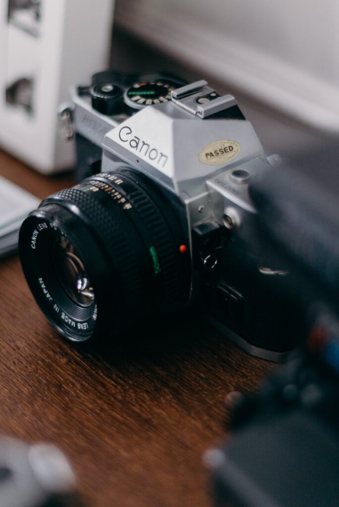 Photograph of a Canon film camera, which were one of the first beneficiaries of ISO compliance standards.