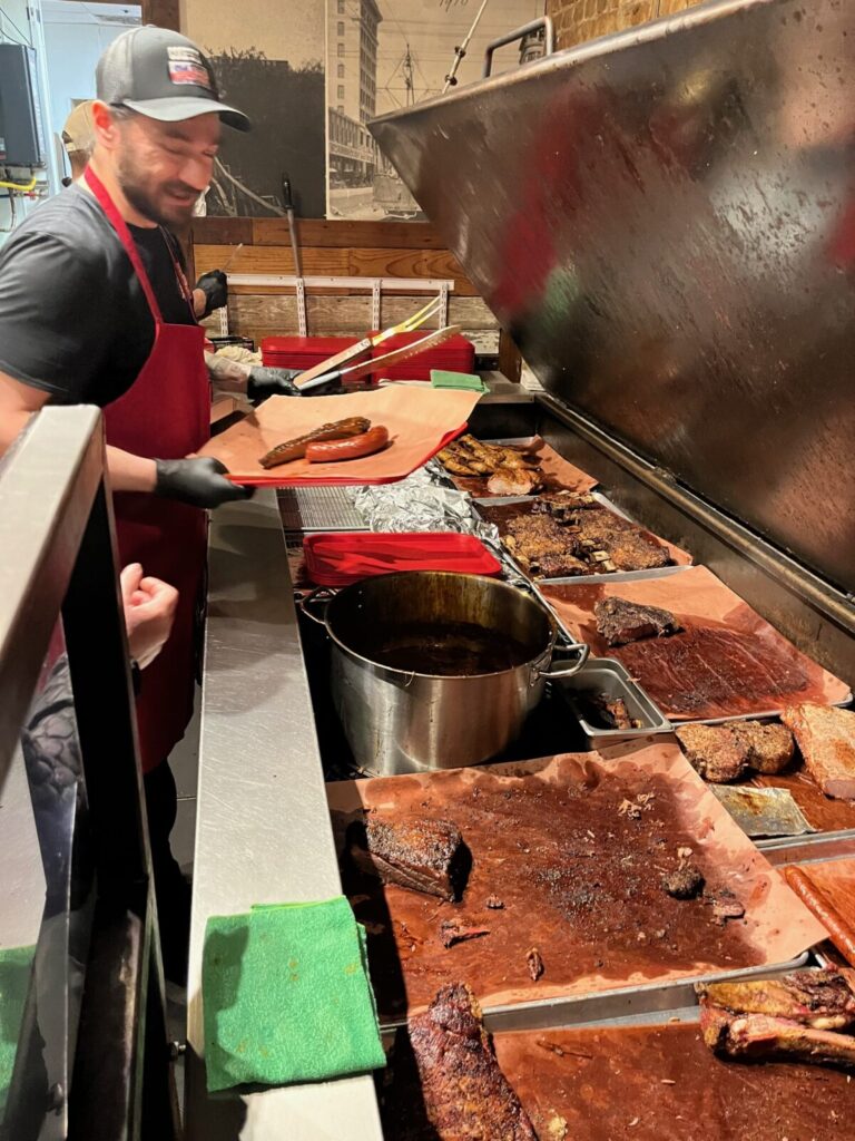 A Texas BBQ kitchen in the midst of making food.