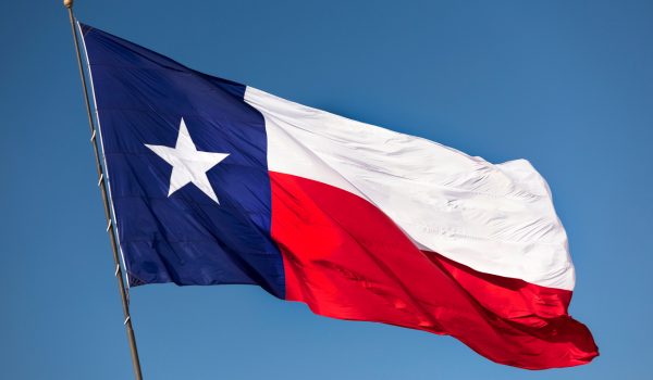 The Texas flag waving in the wind.